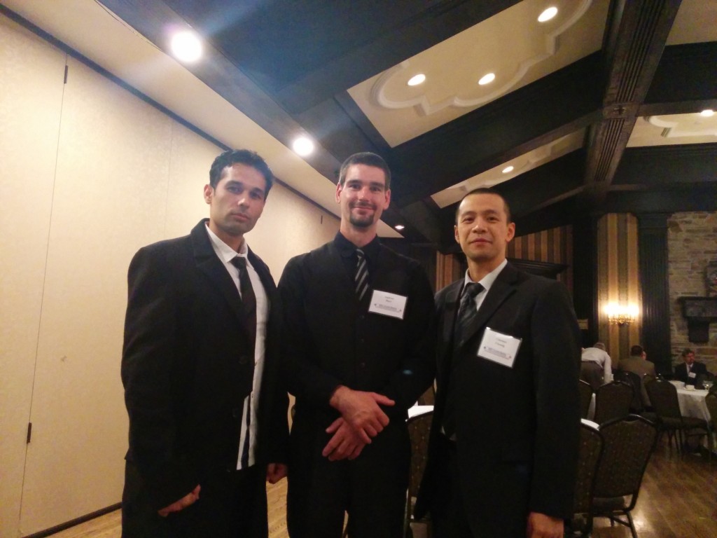 Professor Clarence Cheung (right) with students Andrew Hart (centre) and Navid Rasouli, Centennial IEEE Student Branch Chair, at the IEEE Toronto Section AGM. 
